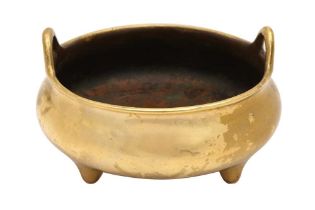 A CHINESE POLISHED BRONZE TRIPOD CENSER 清十九世紀 銅三足爐 《大明宣德年製》款