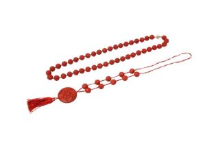 TWO CHINESE CARVED CINNABAR LACQUER BEAD NECKLACES 二十世紀 剔紅珠子項鍊兩件