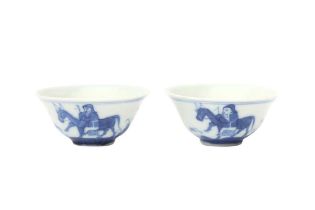 TWO CHINESE BLUE AND WHITE 'DONKEY' CUPS 清十九世紀 青花驢紋盃兩件