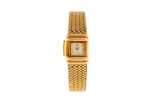 A RARE 18K GOLD ROLEX BRACELET WATCH WITH CONCEALED DIAL