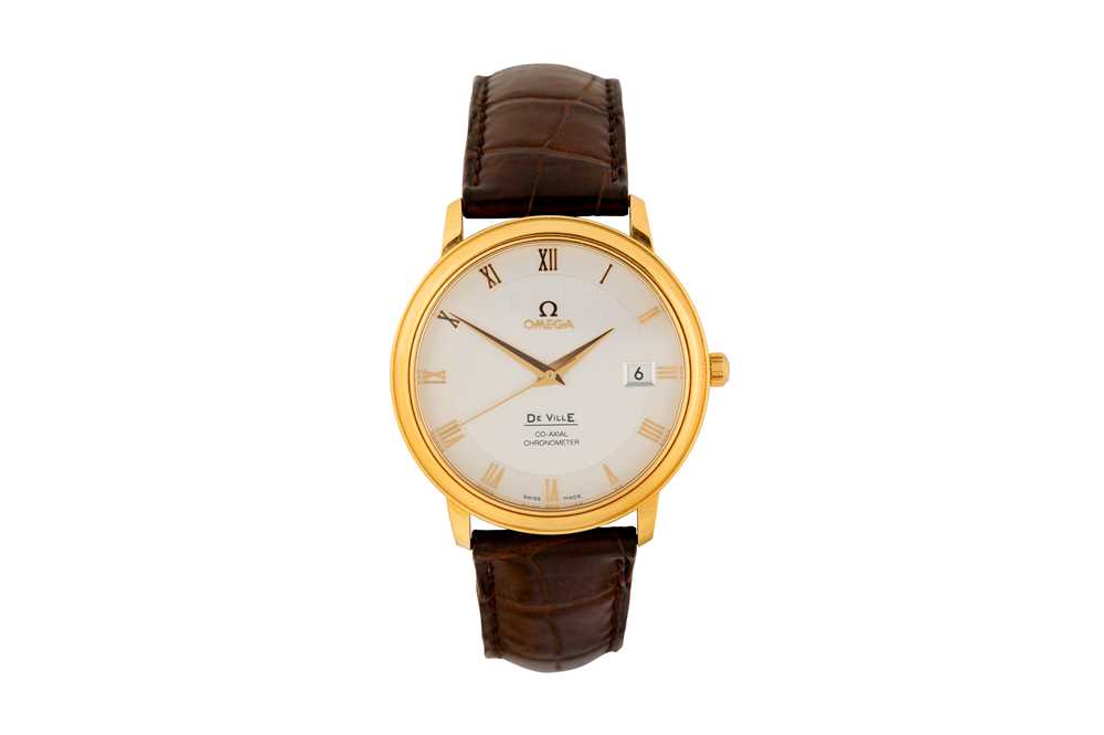 A GENTS 18K GOLD OMEGA DE VILLE DRESS WATCH