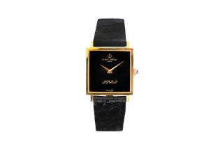 A GENTS 18K GOLD BAUME & MERCIER DRESS WATCH - BAHRAINI INTEREST