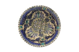 A COBALT BLUE AND TURQUOISE SULTANABAD POTTERY BOWL Possibly Kashan, Iran, 14th - 15th century