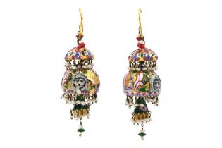 A PAIR OF QAJAR POLYCHROME-PAINTED ENAMELLED EARRINGS Late Qajar Iran, late 19th - early 20th centur