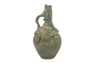 A SMALL MEDIEVAL BRONZE BOTTLE WITH A PERSIAN GAZELLE SPOUT Iran, 8th - 10th century