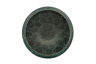 A KASHAN BLACK AND TURQUOISE SILHOUETTE POTTERY BOWL Kashan, Iran, late 12th - early 13th century