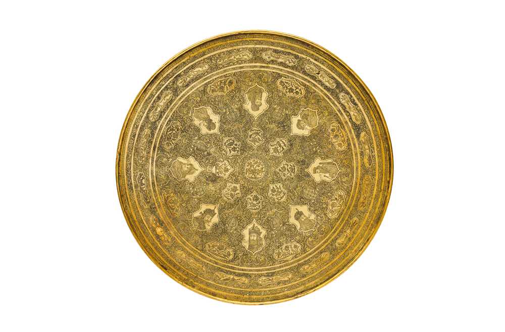 A FINELY ENGRAVED QAJAR BRASS TABLE TOP Qajar Iran, late 19th - early 20th century