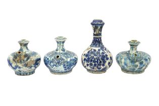 THREE ASIAN-INSPIRED KENDI BLUE AND WHITE POTTERY QALYAN BOTTLES AND A VASE Iran, 18th - 19th centur
