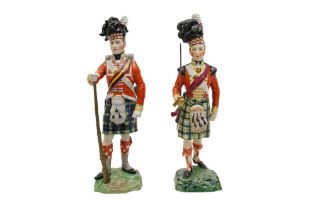 A PAIR OF DRESDEN MILITARY PORCELAIN FIGURES