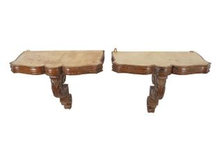 A PAIR OF CARVED CONSOLE TABLES