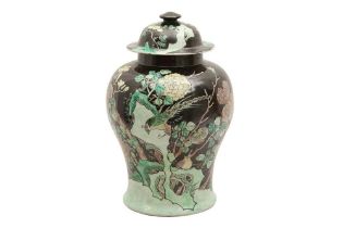 A CHINESE FAMILLE-NOIRE VASE AND COVER