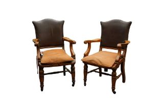 A PAIR OF TURN OF THE CENTURY OAK OFFICE CHAIRS