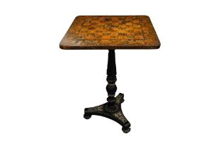 A 19TH CENTURY TILT TOP CHESS TABLE