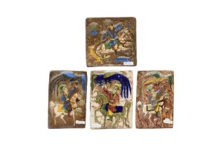 FOUR QAJAR-REVIVAL MOULDED POTTERY TILES WITH RIDERS ON THEIR STEEDS Iran, mid-20th century