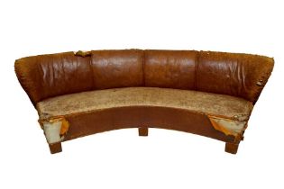 A VICTORIAN CURVED SOFA