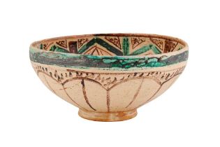 AN IRANIAN NISHAPUR MEDIEVAL-REVIVAL BLACK AND GREEN POTTERY BOWL Iran, 20th century