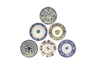 SIX IRANIAN POTTERY DISHES Qajar and post-Qajar Iran, 20th century