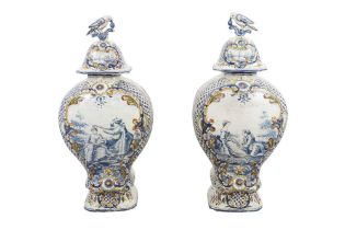 A PAIR OF 19TH CENTURY FRENCH FAIENCE VASES AND COVERS