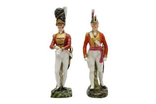 A PAIR OF MILITARY PORCELAIN FIGURES