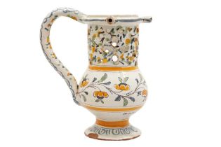 A FRENCH FAIENCE PUZZLE JUG, 18TH CENTURY
