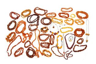 A LARGE GROUP LOT OF AMBER JEWELLERY