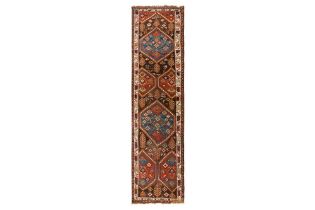 AN UNUSUAL ANTIQUE NORTH-WEST PERSIAN RUNNER