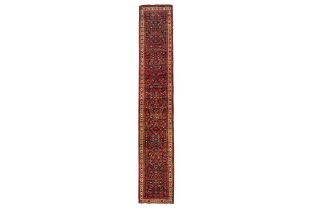 AN ANTIQUE BIJAR RUNNER, NORTH-WEST PERSIA