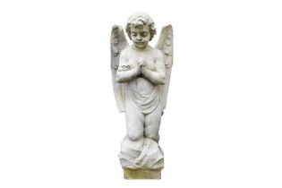 A MARBLE FIGURE OF A KNEELING PUTTO