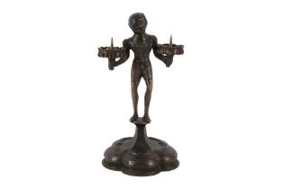 A BRONZE FIGURAL CANDELABRA - NUREMBURG, GERMANY