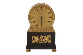 A FRENCH EMPIRE MANTEL CLOCK