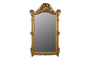 A ROCOCO STYLE GILTWOOD WALL MIRROR