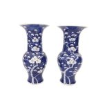 A PAIR OF LARGE CHINESE BLUE AND WHITE YEN YEN 'PRUNUS' VASES