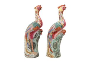 A PAIR OF CHINESE EXPORT FAMILLE-ROSE 'PHOENIX' FIGURES