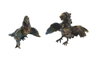 A PAIR OF CAST BRONZE FIGURES OF FIGHTING COCKS