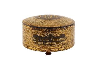 A COMMEMORATIVE GOLD-DAMASCENED TOLEDO STEEL LIDDED BOX WITH THE CHRISTIAN IHS MONOGRAM Plácido Zulo