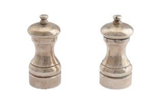 A pair of Elizabeth II sterling silver salt and pepper grinders, London 2004 by M C Hersey and Sons