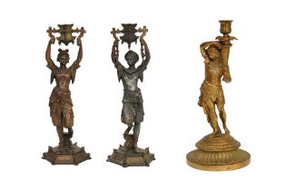 A GROUP OF THREE 19TH CENTURY FIGURAL CANDLESTICKS