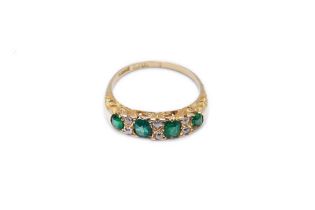 AN 18CT EMERALD AND DIAMOND RING