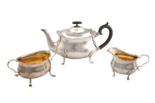 A George V sterling silver three-piece tea-service, Sheffield 1915 by William Hutton View at The Bar