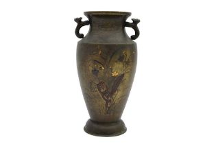 A JAPANESE BRONZE AND MIXED-METAL VASE