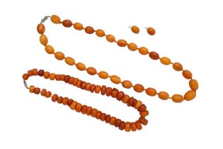 TWO AMBER NECKLACES AND A PAIR OF AMBER EARRINGS