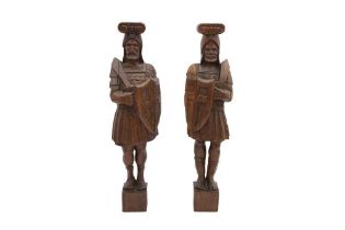 A PAIR OF CARVED OAK FIGURES OF KNIGHTS