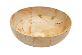 A LARGE STONE SERVING BOWL