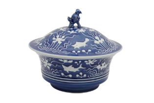 A CHINESE SLIP-DECORATED BLUE-GROUND 'FISH' POT AND COVER