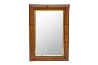 A GEORGE III WALNUT CUSHION FRAMED WALL MIRROR