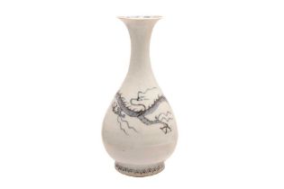 A CHINESE MING-STYLE BLUE AND WHITE 'DRAGON' VASE