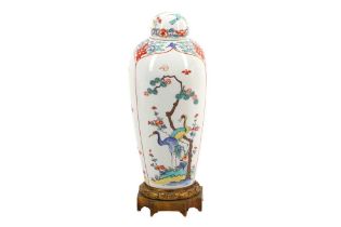 A JAPANESE KAKIEMON-STYLE VASE AND COVER