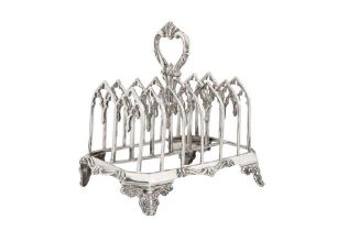 A Victorian sterling silver seven bar toast rack, London 1846 by John Evans View at The Barley Mow C