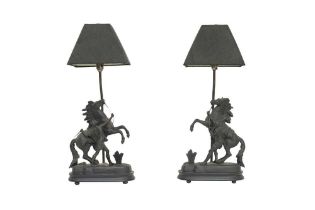 A PAIR OF SPELTER MARLEY HORSE TABLE LAMPS