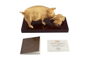 A RISIS OF SINGAPORE 24K GOLD-PLATED ZODIAC 'PIG' FIGURE